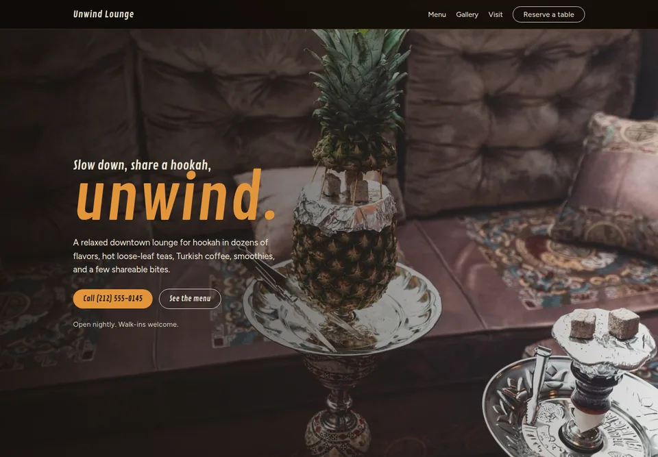 Unwind Lounge website design with an oversized amber word over a warm, low-lit lounge photo.